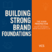 Cover image for Building Strong Brand Foundations January 2026 blog series by The Vivid Perspective, featuring bold headline text on a split blue and orange background with VCS branding and icons of lightbulb, book, handshake, and megaphone.